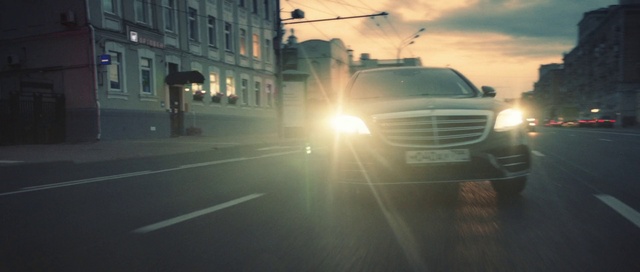 Video Reference: Cloud, Vehicle, Car, Sky, Automotive lighting, Window, Hood, Light, Building, Automotive tire