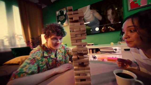 Video Reference: Smile, Tableware, Green, Serveware, Curtain, Leisure, Wood, Indoor games and sports, Event, Recreation