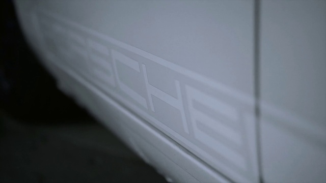 Video Reference: Wood, Tints and shades, Automotive design, Font, Electric blue, Darkness, Composite material, Rectangle, Plaster, Automotive exterior