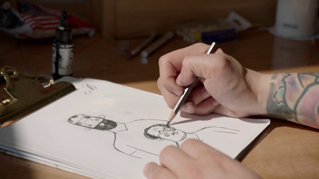 Video Reference: Hand, Table, Automotive design, Gesture, Finger, Desk, Writing instrument accessory, Art, Nail, Artist