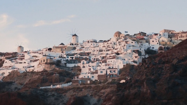 Video Reference: Sky, Cloud, Building, Window, House, Mountainous landforms, Tree, Horizon, Formation, Landscape