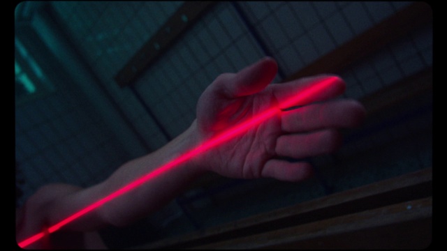 Video Reference: Automotive lighting, Guitar accessory, Gesture, Finger, Musical instrument, Sky, Magenta, Electric blue, Window, Wrist