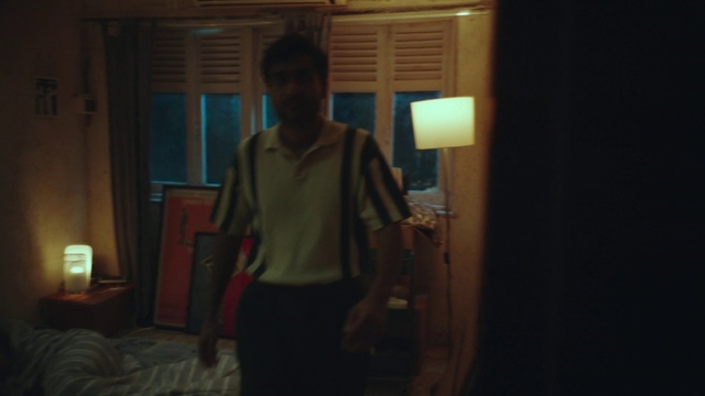 Video Reference: Sleeve, Comfort, Event, Facial hair, Trunk, Chest, Shorts, Darkness, T-shirt, Flooring