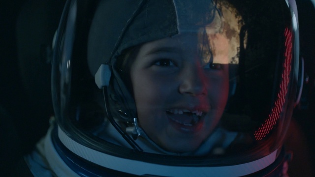 Video Reference: Smile, Eye, Automotive lighting, Flash photography, Mirror, Cameras & optics, Headgear, Automotive design, Personal protective equipment, Electric blue