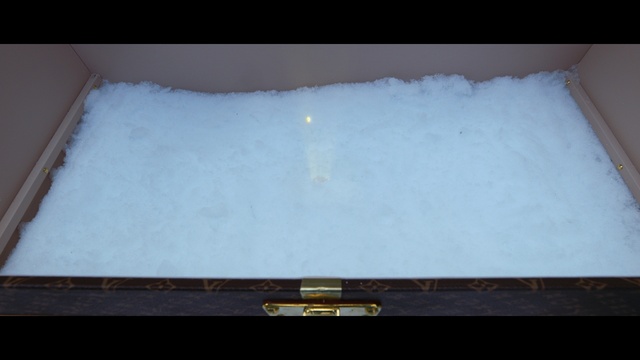 Video Reference: Snow, Automotive exterior, Rectangle, Gas, Tints and shades, Bumper, Wood, Table, Auto part, Slope