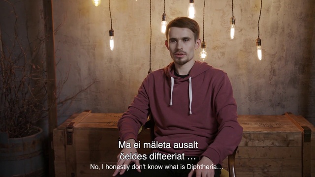 Video Reference: Light, Flash photography, Sleeve, Beard, Eyewear, Event, Font, T-shirt, Sitting, Darkness