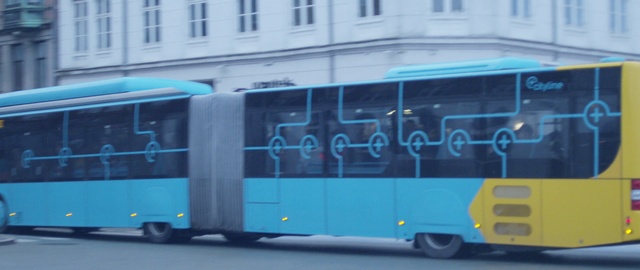 Video Reference: Bus, Land vehicle, Tire, Vehicle, Wheel, Window, Motor vehicle, Blue, Electricity, Building