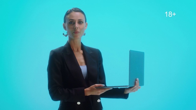 Video Reference: Blue, Green, Coat, Azure, Computer, Gesture, Suit, Spokesperson, Blazer, Personal computer