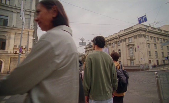 Video Reference: Window, Building, Sleeve, Temple, Gesture, Sky, Street fashion, Travel, Public space, City