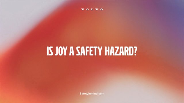 Video Reference: title card, text, gradient background, Volvo, safety, question, promotional, branding, blurred, abstract, red, orange, purple, website