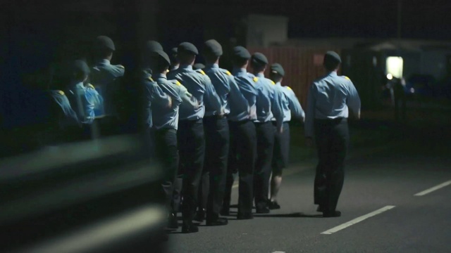 Video Reference: Peaked cap, Military uniform, Military person, Security, Gesture, Soldier, Non-commissioned officer, Government agency, Army, Military organization