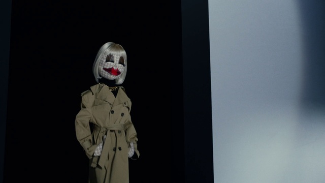 Video Reference: Sleeve, Grey, Toy, Performing arts, Art, Fashion design, Flash photography, Entertainment, Event, Formal wear