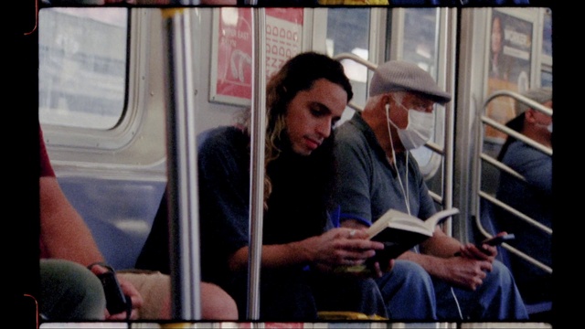 Video Reference: Hand, Vehicle, Hat, Motor vehicle, Public transport, Passenger, Train, Fun, T-shirt, Event