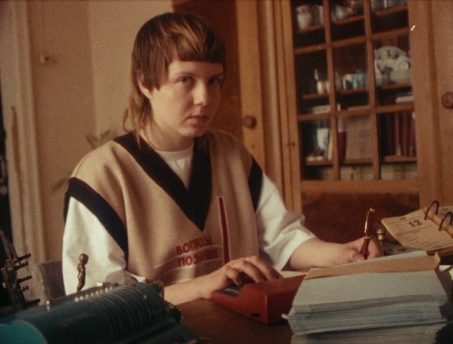 Video Reference: Shelf, Office supplies, Picture frame, Office equipment, Camera, Desk, Bookcase, Wood, Single-lens reflex camera, Book