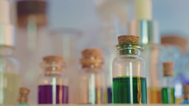 Video Reference: Liquid, Drinkware, Bottle, Fluid, Solution, Glass bottle, Drink, Glass, Plastic bottle, Tints and shades