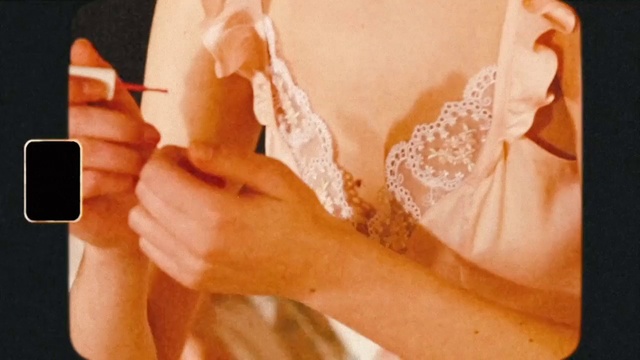 Video Reference: Wedding dress, Neck, Orange, Gesture, Finger, Nail, Bride, Wrist, Thumb, Bridal accessory