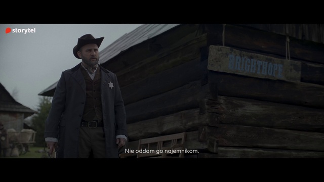 Video Reference: Flash photography, Hat, Screenshot, Formal wear, Darkness, Font, Fictional character, Pc game, Official