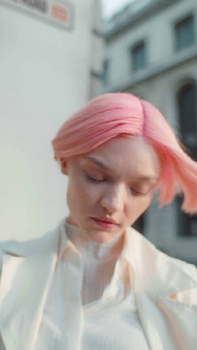 Video Reference: Lip, Neck, Eyelash, Bangs, Long hair, Wig, Red hair, Headpiece, Peach, Jewellery