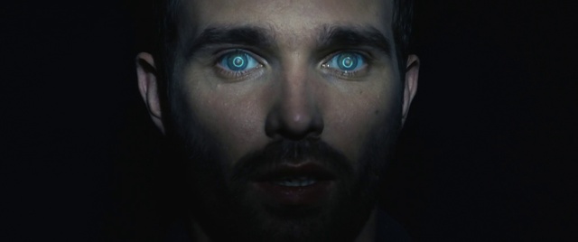 Video Reference: Nose, Colorfulness, Eyelash, Flash photography, Jaw, Beard, Black hair, No expression, Electric blue, Darkness