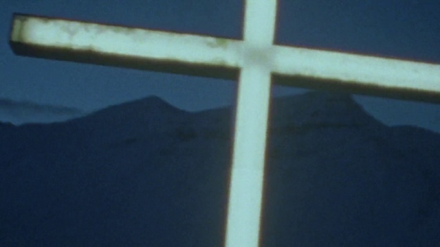 Video Reference: Azure, Cross, Tints and shades, Fixture, Electric blue, Symmetry, Symbol, Pattern, Window, Composite material