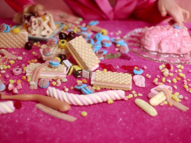 Video Reference: Pink, Wood, Toy, Magenta, Art, Recreation, Sweetness, Event, Rectangle, Fashion accessory