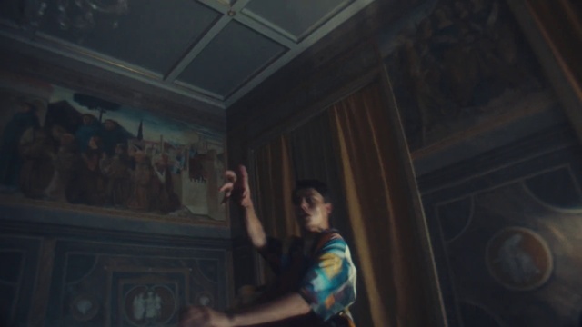 Video Reference: Shirt, Flash photography, T-shirt, Wood, Event, Darkness, Entertainment, Ceiling, Elbow, Curtain