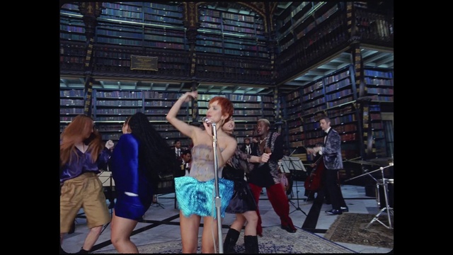 Video Reference: Shorts, Flash photography, Entertainment, Leisure, Performing arts, Guitar, Event, Fun, Stage, Performance art