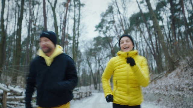 Video Reference: Outerwear, Snow, Natural environment, Glove, Tree, Sky, Outdoor recreation, Smile, Yellow, Jacket