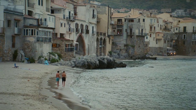 Video Reference: Water, Building, Window, Body of water, Coastal and oceanic landforms, Beach, Morning, House, City, Facade