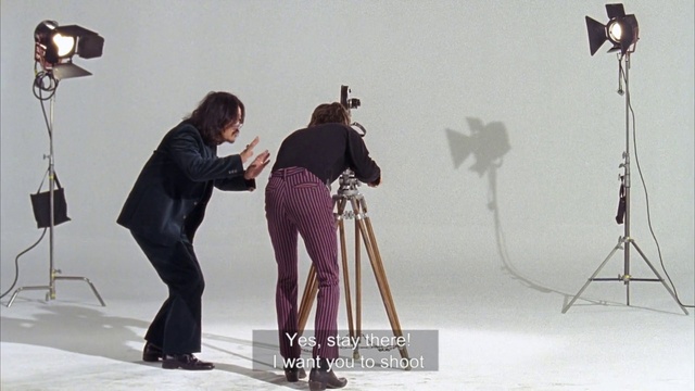 Video Reference: Photograph, Lighting, Art, Fashion design, Tripod, Snapshot, Event, Visual arts, Automotive design, Boot