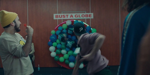 Video Reference: Balloon, Toy, Organism, Baseball cap, Party supply, Recreation, Cap, Fun, Event, Electric blue