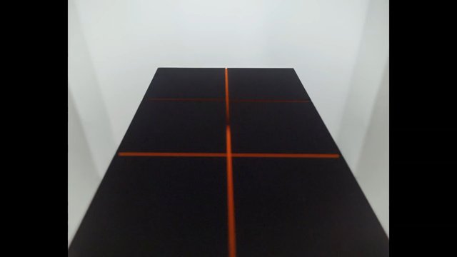 Video Reference: abstract, minimalist, geometric, black surface, orange lines, cross, symmetry, indoor, white background, modern, pattern, rectangular, perspective
