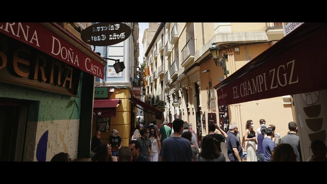 Video Reference: Infrastructure, Neighbourhood, Travel, City, Building, Shopping, Market, Road, T-shirt, Retail