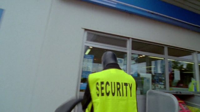 Video Reference: High-visibility clothing, Fixture, Sleeve, Automotive exterior, Workwear, Gas, Font, Security, Window, Personal protective equipment