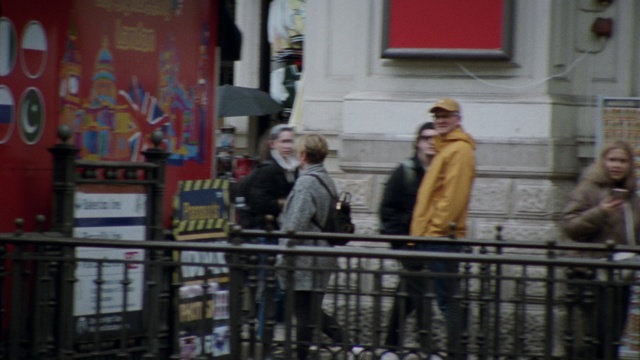 Video Reference: Fence, Human settlement, Facade, City, Art, Event, Street, Pedestrian, Building, Travel