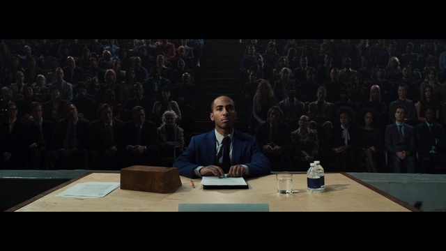 Video Reference: Table, Microphone, World, Suit, Chair, Spokesperson, Desk, Event, Public speaking, Speaker