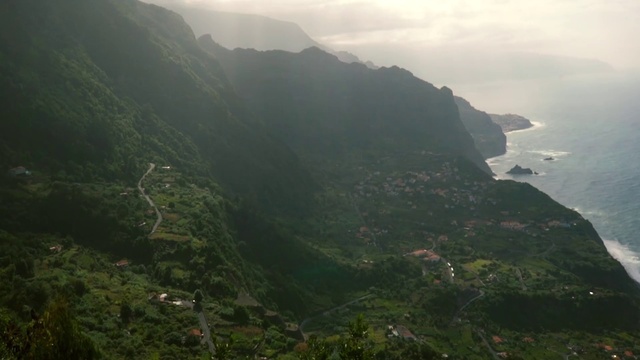 Video Reference: Sky, Water, Mountain, Cloud, Plant, Natural landscape, Terrain, Atmospheric phenomenon, Landscape, Tree