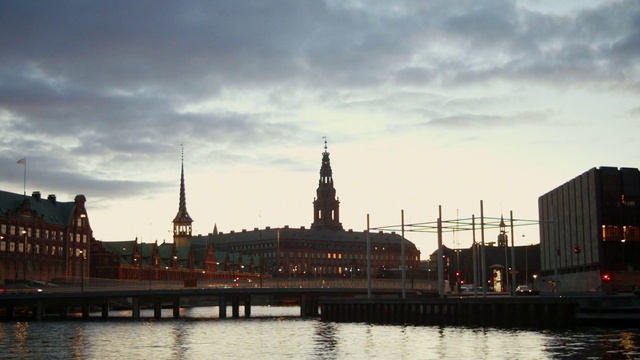 Video Reference: Cloud, Water, Sky, Building, Dusk, Lake, Body of water, Cityscape, Sunset, Horizon