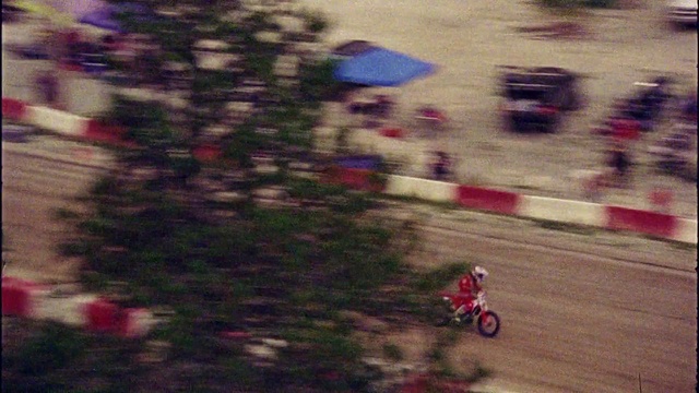 Video Reference: Tire, Wheel, Land vehicle, Vehicle, Motocross, Motorcycle, Automotive tire, Plant, Asphalt, Pink