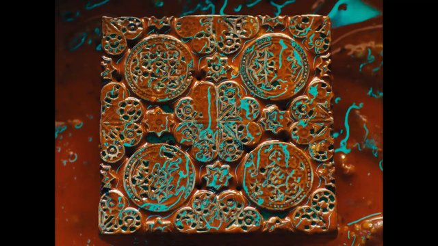 Video Reference: ornate, decorative, metal, embossed, pattern, square, close-up, texture, abstract, turquoise, brown, craft, ornament, industrial, surface, design