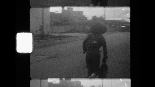 Video Reference: Window, Standing, Automotive lighting, Black-and-white, Automotive mirror, Mode of transport, Style, Rectangle, Tints and shades, Monochrome