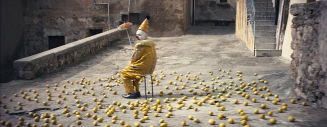 Video Reference: Footwear, Road surface, Yellow, Asphalt, Flooring, Sidewalk, Human settlement, Road, Cobblestone, Toy