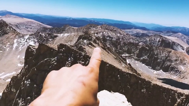 Video Reference: Sky, Mountain, Cloud, Slope, Gesture, Terrain, Bedrock, Ice cap, Snow, Formation