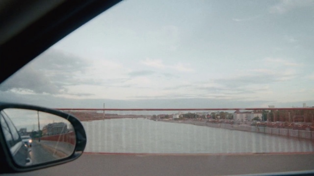 Video Reference: Water, Cloud, Sky, Automotive side-view mirror, Mirror, Automotive mirror, Vehicle, Body of water, Mode of transport, Rear-view mirror