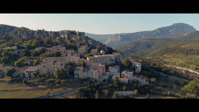 Video Reference: Sky, Mountain, Building, Natural landscape, Vegetation, Plant, Terrain, Tree, Landscape, Horizon