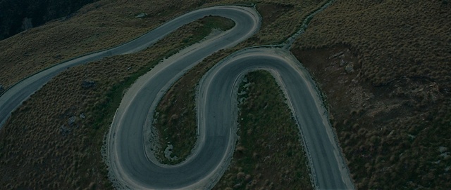 Video Reference: Road surface, Asphalt, Race track, Thoroughfare, Landscape, Oxbow lake, Natural landscape, Urban design, Road, Tar