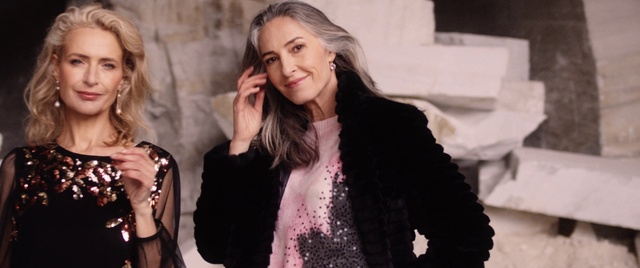 Video Reference: Hair, Lip, Outerwear, Sleeve, Flash photography, Gesture, Style, Smile, Fashion design, Happy