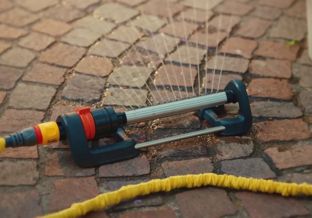 Video Reference: Water, Yellow, Line, Gas, Bicycle handlebar, Asphalt, Electric blue, Pipe, Road surface, Wire