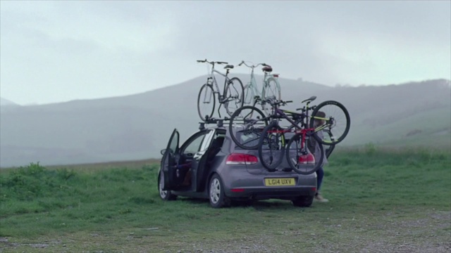 Video Reference: Automotive bicycle rack, Wheel, Bicycle, Tire, Vehicle, Car, Sky, Motor vehicle, Bicycle wheel, Automotive carrying rack