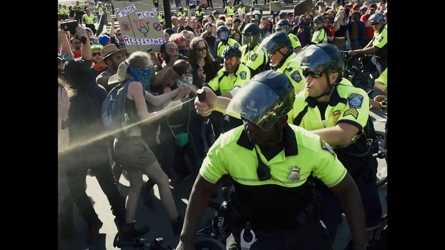 Video Reference: Helmet, Personal protective equipment, Crowd, Event, Fun, Recreation, Motor vehicle, Leisure, Fan, T-shirt